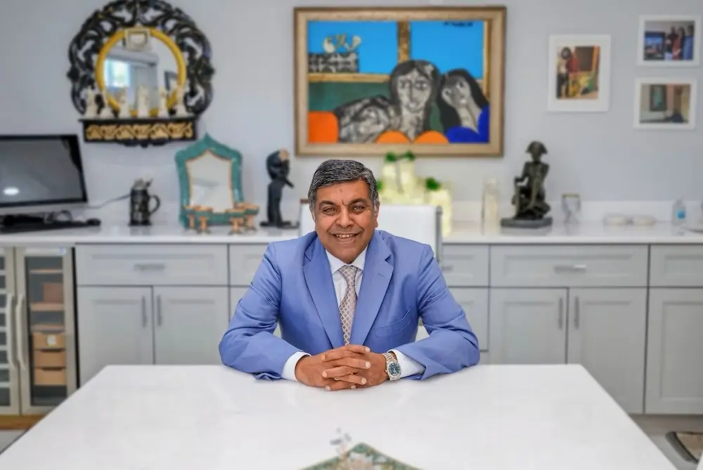 ceo usman ejaz sitting at his office